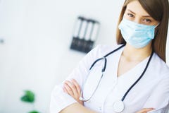Clinic. Smiling young doctor in hospital corridor royalty free stock image Clinic. Smiling young doctor in hospital corridor royalty free stock image