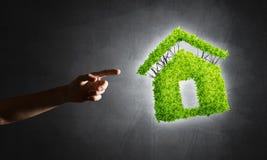 Concept of eco architecture presented by green house on dark background royalty free stock images Concept of eco architecture presented by green house on dark background royalty free stock images