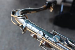 Close-up Alto Saxophone can be played in many styles of music, whether it& x27;s classic style, pop, jazz. stock photos Close-up Alto Saxophone can be played in many styles of music, whether it& x27;s classic style, pop, jazz. stock photos