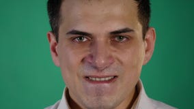 Close up of angry businessman. negative emotions on green chroma key background stock video Close up of angry businessman. negative emotions on green chroma key background stock video