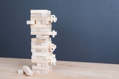 Close up blocks wood game with word risk on tower wood block wo Royalty Free Stock Images Close up blocks wood game with word risk on tower wood block wo Royalty Free Stock Images