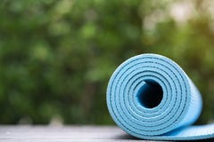 Close up of blue yoga mat on the table Stock Photography Close up of blue yoga mat on the table Stock Photography