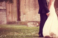 Close up of a bride and groom holding hands stock images Close up of a bride and groom holding hands stock images