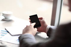 Close up.businessman reading text message on smartphone stock images Close up.businessman reading text message on smartphone stock images