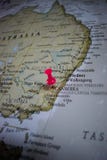 Close up of Canberra pin pointed on the world map with a pink pushpin royalty free stock photo Close up of Canberra pin pointed on the world map with a pink pushpin royalty free stock photo