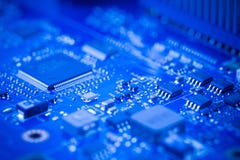 Close Up - Chip in a computer circuit board motherboard stock photos Close Up - Chip in a computer circuit board motherboard stock photos