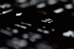 Close up da iluminação do teclado do portátil Conceito para a tecnologia computando e moderna Computador, rede, Internet fotografia de stock Close up da iluminação do teclado do portátil Conceito para a tecnologia computando e moderna Computador, rede, Internet fotografia de stock