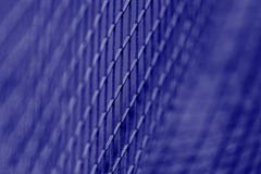 Close up details of a tennis net. Blue color filter. Professional sport concept. Horizontal sport poster, greeting cards, headers,