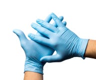 Close up of Doctors hands putting on nitrile