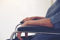 Close-up of Elderly Woman`s Hands on wheelchair, Thailand royalty free stock photo Close-up of Elderly Woman`s Hands on wheelchair, Thailand royalty free stock photo