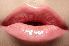 Close-up of fashion lips makeup in sweet kiss