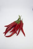 Close-up of chili peppers on white background stock photo Close-up of chili peppers on white background stock photo