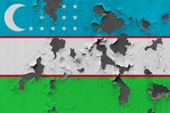 Close up grungy, damaged and weathered Uzbekistan flag on wall peeling off paint to see inside surface stock photography Close up grungy, damaged and weathered Uzbekistan flag on wall peeling off paint to see inside surface stock photography