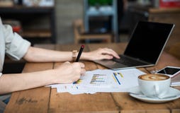 Close up the hand of an Asian girl is freelancer woman Stock Images Close up the hand of an Asian girl is freelancer woman Stock Images
