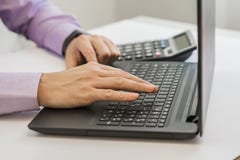 Close up hands multitasking man using laptop connecting wifi. royalty free stock photo Close up hands multitasking man using laptop connecting wifi. royalty free stock photo