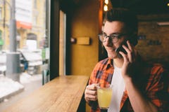 Close up on the hands of a young handsome man using smartphone, tapping the screen - technology, social networ stock photos Close up on the hands of a young handsome man using smartphone, tapping the screen - technology, social networ stock photos
