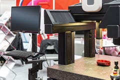 Close up head probe of modern and high accuracy automatic coordinate measurement machine CMM with monitor display during stock photography Close up head probe of modern and high accuracy automatic coordinate measurement machine CMM with monitor display during stock photography
