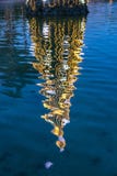 Illuminated decorated New Year tree reflected in the water stock photos Illuminated decorated New Year tree reflected in the water stock photos