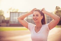 Close Up Image Of Smiling Young Woman Running. Stock Photos