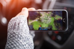 Close-up of man hand playing video games on smartphone. stock image Close-up of man hand playing video games on smartphone. stock image