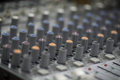 Close up of a mixing console with sliders and buttons. stock images Close up of a mixing console with sliders and buttons. stock images