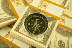 Close Up Money And Compass Concept Stock Images