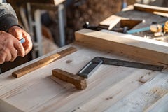 Close Up Photo, Manual Processing Of Wood In The Carpentry Home Workshop, The Master Work With A Peacefullness Royalty Free Stock Photography