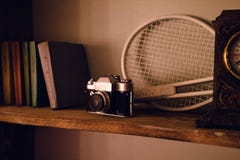 Close up photo of old camera lens over wooden shelf stock images Close up photo of old camera lens over wooden shelf stock images
