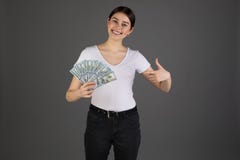 Close Up Portrait Of Happy Eurupean Woman Holding Money  On Grey Background Stock Photography