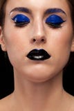 Close Up Portrait Of Woman Wearing Blue Make Up With Black Lips Royalty Free Stock Image