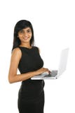 Close up portrait of a smiling Indian business woman working on a laptop royalty free stock photo Close up portrait of a smiling Indian business woman working on a laptop royalty free stock photo