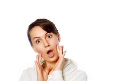 Close-up portrait of surprised beautiful girl holding her head in amazement and open-mouthed. Over white background. royalty free stock photo Close-up portrait of surprised beautiful girl holding her head in amazement and open-mouthed. Over white background. royalty free stock photo