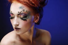 Young beautiful woman with colorful bright make-up royalty free stock image Young beautiful woman with colorful bright make-up royalty free stock image
