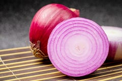 Close Up`Red Onion On A Black Background Royalty Free Stock Photography