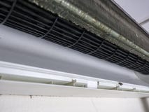 Close up of removed cover of air conditioner and cleaned squirrel cage fan, home air conditioner service. royalty free stock photography Close up of removed cover of air conditioner and cleaned squirrel cage fan, home air conditioner service. royalty free stock photography