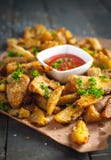 Close-up of roasted potatoes with rosemary, Parmesan cheese and fresh parsley on top royalty free stock photo Close-up of roasted potatoes with rosemary, Parmesan cheese and fresh parsley on top royalty free stock photo