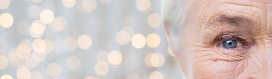 Close up of senior woman face and eye stock images Close up of senior woman face and eye stock images