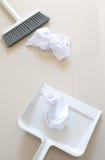 A close up shot of household floor cleaning items and paper Royalty Free Stock Images A close up shot of household floor cleaning items and paper Royalty Free Stock Images
