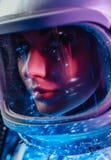 Close up shot of spacewoman in galaxy light
