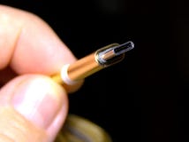 Close up shot of an USB Type-C connection on an isolated background royalty free stock image Close up shot of an USB Type-C connection on an isolated background royalty free stock image