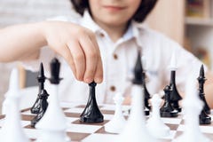 Close up. Smart boy move by bishop. Game of chess. royalty free stock photos Close up. Smart boy move by bishop. Game of chess. royalty free stock photos