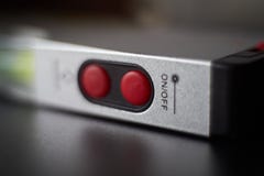 Laser spirit level on of buttons royalty free stock images Laser spirit level on of buttons royalty free stock images