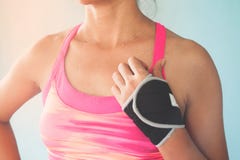 Close up sporty woman in pink color sport bra, Breast cancer, He stock photo Close up sporty woman in pink color sport bra, Breast cancer, He stock photo