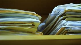 Close up of stacks of paper in the archive