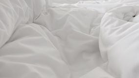 Close Up Top View Of White Pillow On Bed And With Wrinkle Messy Blanket In Bedroom Stock Photo