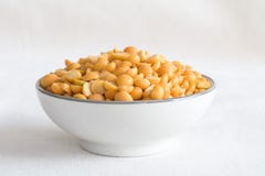 Yellow Split Peas in a Bowl. Close up view of uncooked yellow split peas in a bowl stock photo Yellow Split Peas in a Bowl. Close up view of uncooked yellow split peas in a bowl stock photo