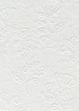 Close up white toilet paper texture. White textured WC paper with floral ornament. stock photography Close up white toilet paper texture. White textured WC paper with floral ornament. stock photography