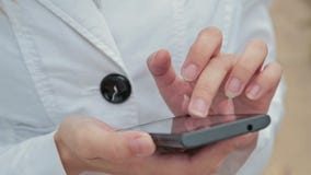 Close-up Woman Hands Using Touchscreen Phone Stock Images Close-up Woman Hands Using Touchscreen Phone Stock Images