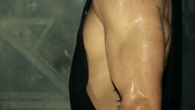 Close up of Young Man Bicep Curl Routine