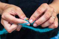 Close-up Young woman knitting royalty free stock photography Close-up Young woman knitting royalty free stock photography